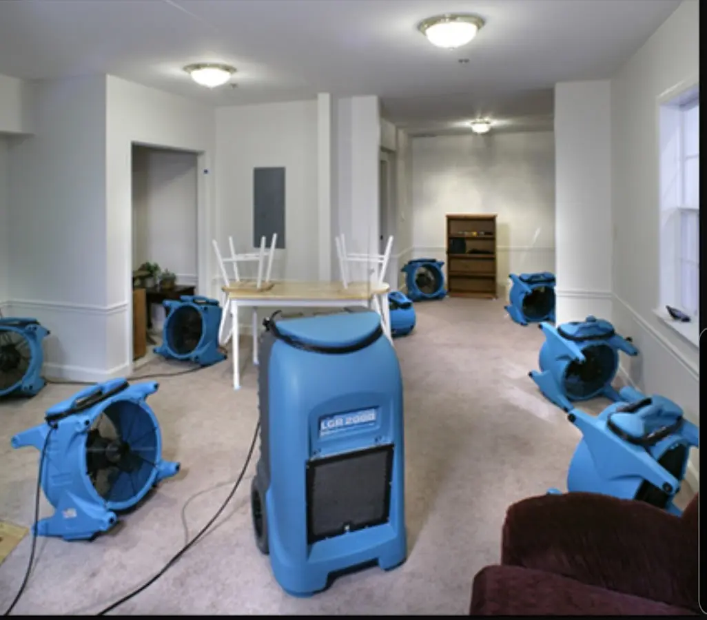 Air movers and dehumidifier setup for Water Damage Restoration in Litchfield